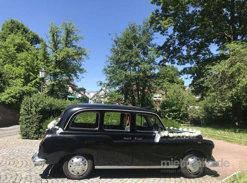Hochzeitsauto mieten & vermieten - LondonTaxi/Wedding Kutsche in weiss zur Hochzeit-Fotoshooting-Hochzeitsauto-London Taxi in Köln