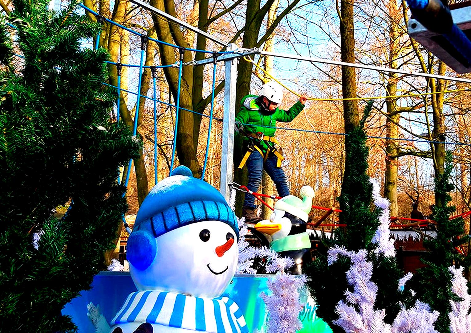 Klettergeräte mieten & vermieten - Klettern im Winterwald mieten – Der mobile Kinderhochseilgarten als Winter-Attraktion in Bramsche