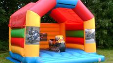 Hüpfburg mit Motorrad Spielmodul