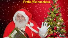 Weihnachtsmann mit dekorierten LKW für Bescherung