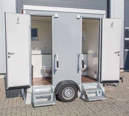 Toilettenwagen mieten & vermieten - Toilettenwagen 1&1 silber in Dorsten