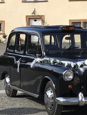 Hochzeitsauto mieten & vermieten - LondonTaxi/Wedding Kutsche in weiss zur Hochzeit-Fotoshooting-Hochzeitsauto-London Taxi in Köln