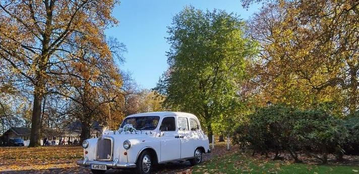 Hochzeitsauto mieten & vermieten - LondonTaxi/Wedding Kutsche in weiss zur Hochzeit-Fotoshooting-Hochzeitsauto-London Taxi in Köln