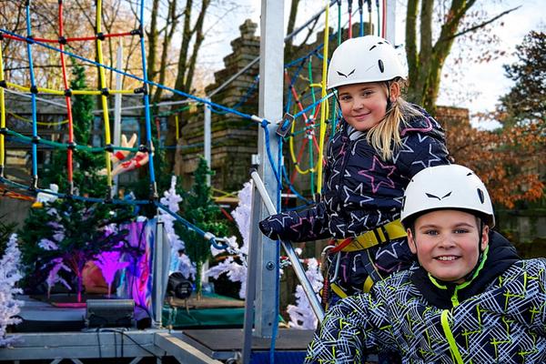 Klettergeräte mieten & vermieten - Klettern im Winterwald mieten – Der mobile Kinderhochseilgarten als Winter-Attraktion in Bramsche