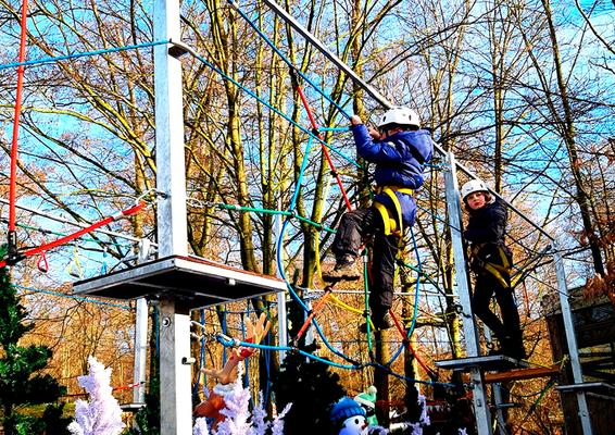 Klettergeräte mieten & vermieten - Klettern im Winterwald mieten – Der mobile Kinderhochseilgarten als Winter-Attraktion in Bramsche